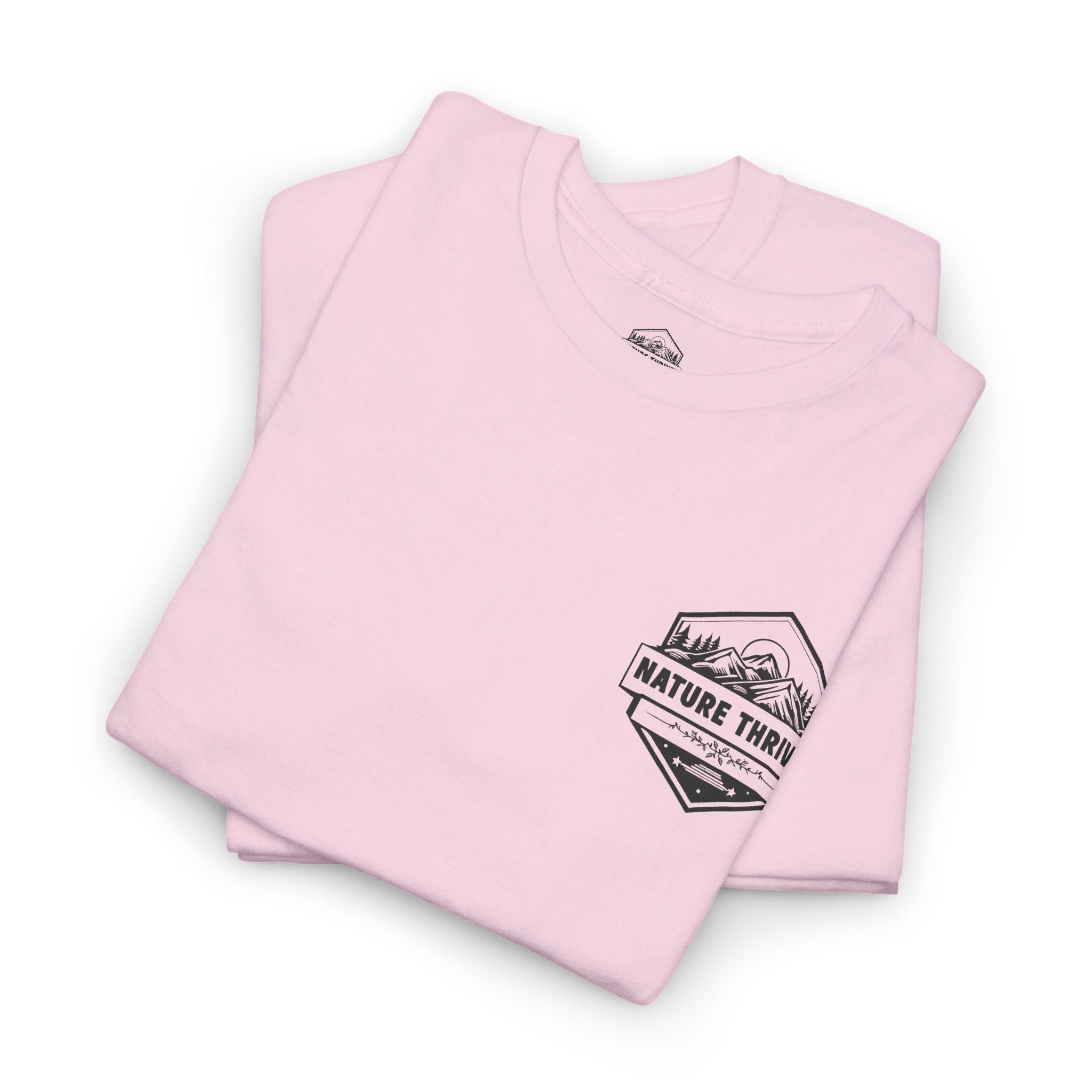 Folded pink t-shirt with a black graphic and text on a white background